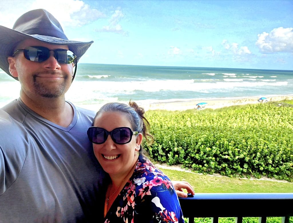 My Town Founder Kristy Burns & Husband Geoff Burns in front of Jensen Beach